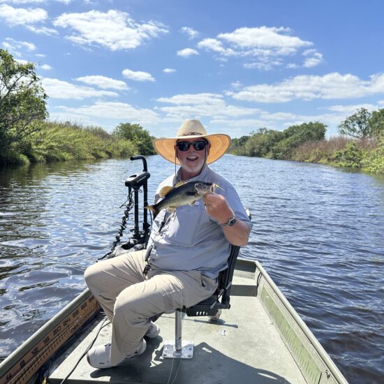 Guy with first Largemouth at Pump Station
